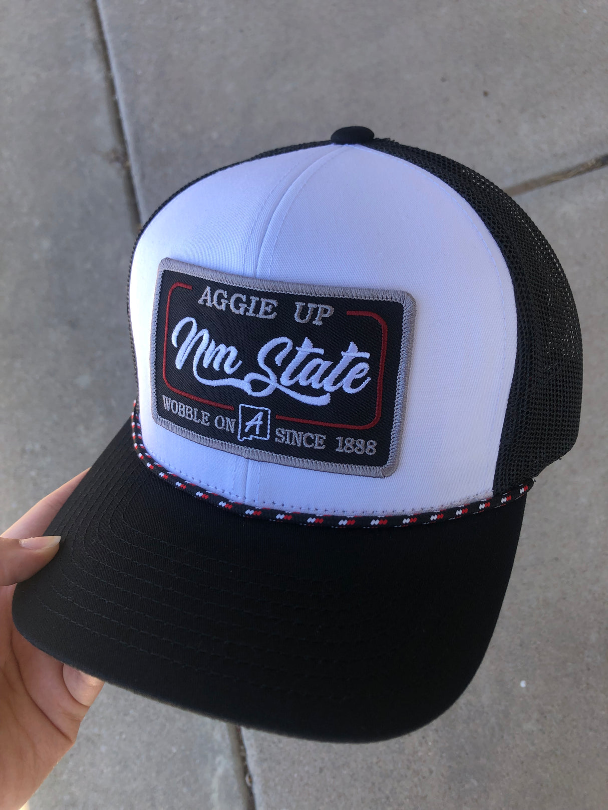 AGGIE UP NM STATE WOBBLE ON CAP